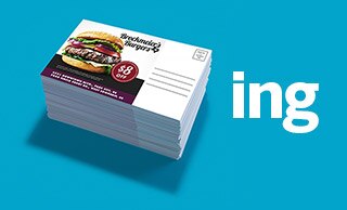Stack of postcards against a blue background next to the letters ING