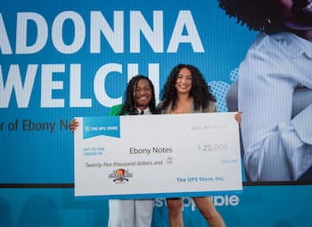  LaDonna and Julissa with Check