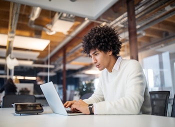 a man on a laptop