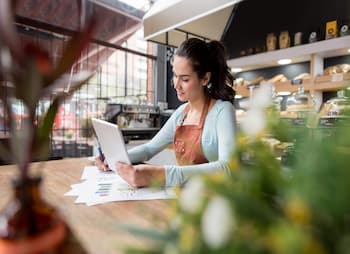 woman reading tablet