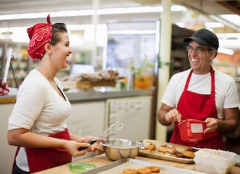 coworkers making baked goods together