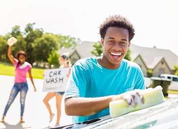 high school students host fundraising car wash