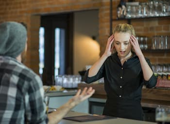 barista with unhappy customer