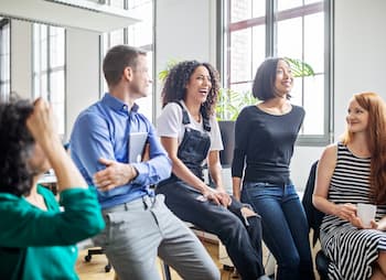staff laughs together during break
