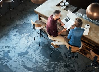 birds eye view of two people meeting