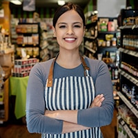 Woman with black hair smiling