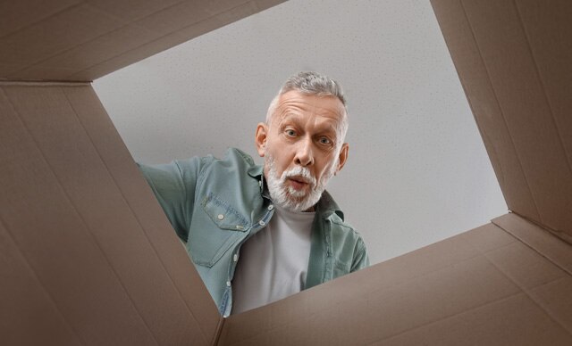 Man looking into a box