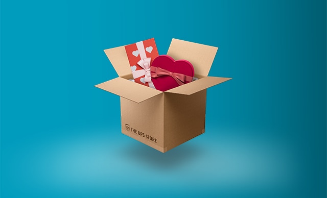 An open shipping box with gifts