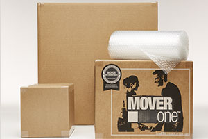3 moving boxes and roll of cushion wrap