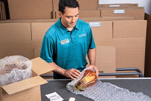 Associate packing an item