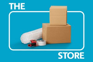 Boxes and packing supplies on a blue background
